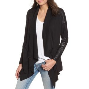 Black vegan leather and suede motto jacket